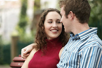 Couple Smiling at each other