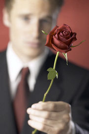 Man in suit with rose